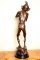 Delightful-Bronze-Dancing-Cornish-Pixie-Playing-Shell-4