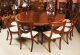 Vintage 9ftx6ft3" Oval Flame Mahogany Jupe Dining Table & 12 chairs 20th C | Ref. no. A3523a | Regent Antiques