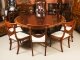 Vintage 9ftx6ft3" Oval Flame Mahogany Jupe Dining Table & 12 chairs 20th C | Ref. no. A3523a | Regent Antiques