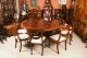 Vintage 9ftx6ft3" Oval Flame Mahogany Jupe Dining Table & 12 chairs 20th C | Ref. no. A3523a | Regent Antiques