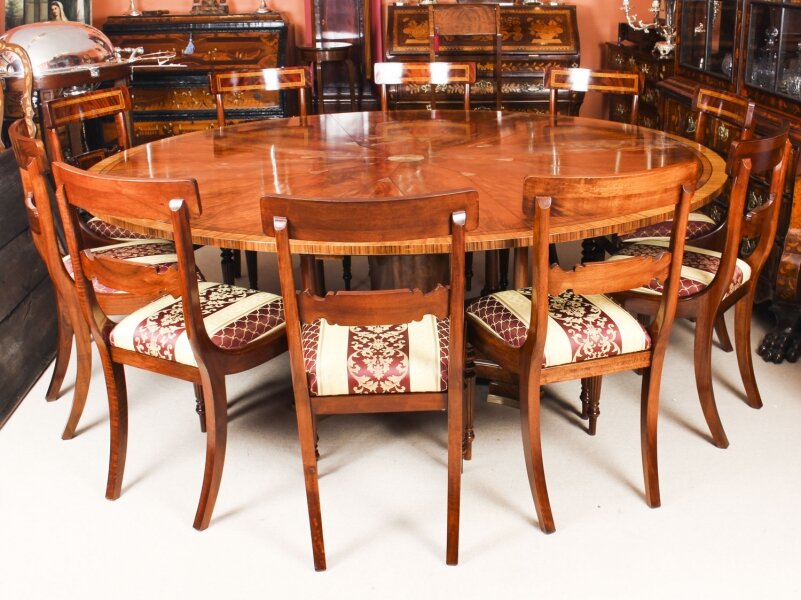 Antique 7ft diameter Flame Mahogany Jupe Dining Table 20th C & 10 chairs | Ref. no. 09993b | Regent Antiques