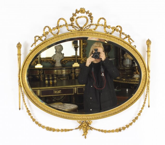 Antique Sheraton Revival Hand Carved Giltwood Oval Mirror 19th Century Antique Sheraton Revival Hand Carved Giltwood Oval Mirror 19th Century | Ref. no. A2997 | Regent Antiques