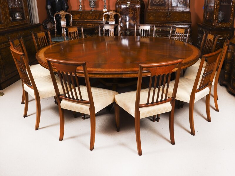 Vintage 7ft6" diameter Flame Mahogany Jupe Dining Table 12 chairs Harrods 20th C | Ref. no. A5229a | Regent Antiques